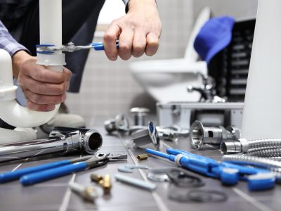 Canva Plumber At Work In A Bathroom Plumbing Repair Service Assemble And Install Concept 3 Orig